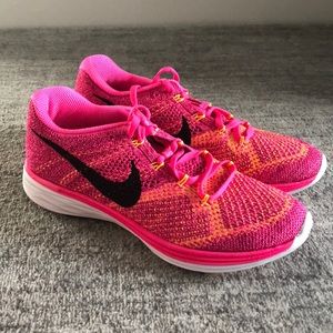 Women’s Nike Flyknit Lunar running shoes pink